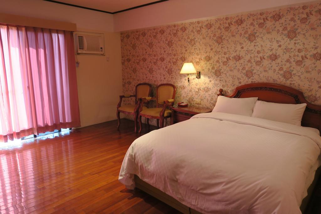 Champagne Hotel Csiaohszi Szoba fotó