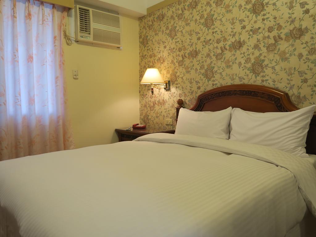 Champagne Hotel Csiaohszi Szoba fotó